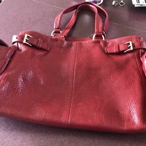 Red top grain leather handbag.